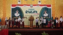 Teks Foto - Bupati Pasbar Hamsuardi meresmikan lomba Cerdas Alquran Tingkat SD dan SMP se- Pasaman Barat