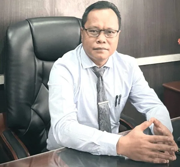 Kepala Dinas Koperasi dan Perdagangan Kabupaten Asahan