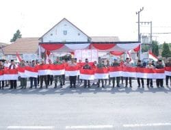 Bupati dan Forkopimda Asahan Bagikan 5.350 Bendera Merah Putih