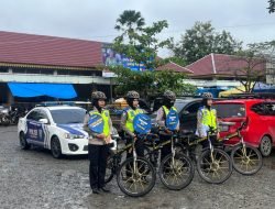 Empat Polwan Cantik Keliling Bersepeda Sampaikan Pesan Pemilu Damai di Kota Rengat