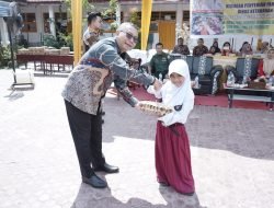 Bupati Asahan Beri Makanan Tambahan Pada 500 Anak SD