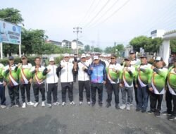 Camat Kisaran Timur Ikuti Kirab Api PON XXI Aceh-Sumut 2024