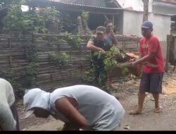 Koramil Leces Mempelopori Kerja Bakti Bersihkan Jalan Desa