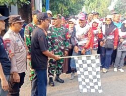 Ribuan Warga Tamanan Kota Kediri Antusias Ikuti Jalan Sehat di HUT ke-80 RI