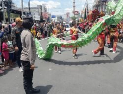 Polsek Krian Amankan Kirab Budaya Sedekah Bumi Perayaan Kongco Kong Tek Cun Ong