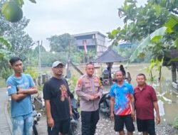 Curah Hujan Tinggi, Polisi Bersama Perangkat Desa Cek Debit Air Sungai dan Aktivitas Transportasi Tambang