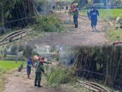 Jaga Keselamatan Pengguna Jalan, Babinsa Bersama Warga Gelar Kerja Bakti