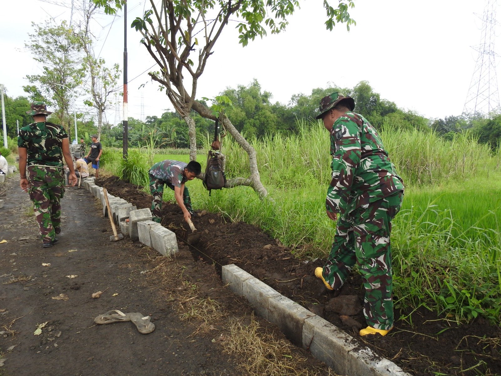 program TNI Manunggal Membangun Desa (TMMD)