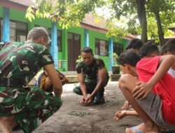 Satgas TMMD Kodim Kediri Ajak Anak-Anak Bermain Permainan Tradisional