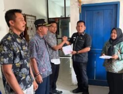 Optimalkan Pendapatan Daerah, Camat Air Batu Pimpin Penyerahan SPPT PBB di Desa Pulau Pule