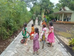 Jalan Paving TMMD Berikan Keceriaan Anak-anak Dusun Klagin