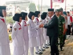 Camat Airjoman Kukuhkan Paskibra 2026 untuk Peringatan HUT ke-81 RI