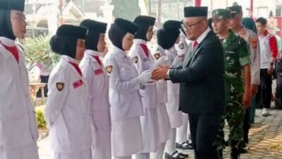 Camat Airjoman Kukuhkan Paskibra 2026 untuk Peringatan HUT ke-81 RI