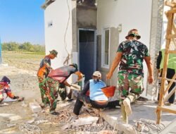 Sentuhan Emas’ Satgas TMMD 129 Bojonegoro: Pastikan Lantai Musholla Rest Area Kesongo Rapi dan Presisi