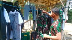 Jelang Penutupan TMMD, Prada Tri Dani Rapikan Perlengkapan